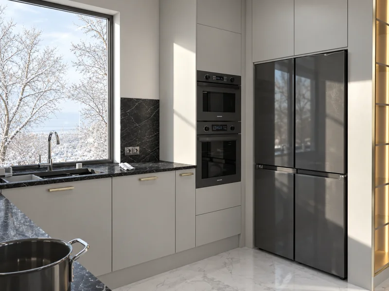 Tall cabinetry with equipment, light-coloured cabinet doors and gold-tone handles.